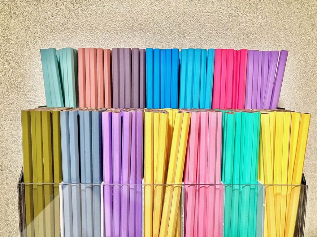 Hexagonal plain pencil color samples by Eyeball Pencil Co., Ltd., showing pastel and muted custom coating options available for PANTONE or DIC color-specified OEM orders.